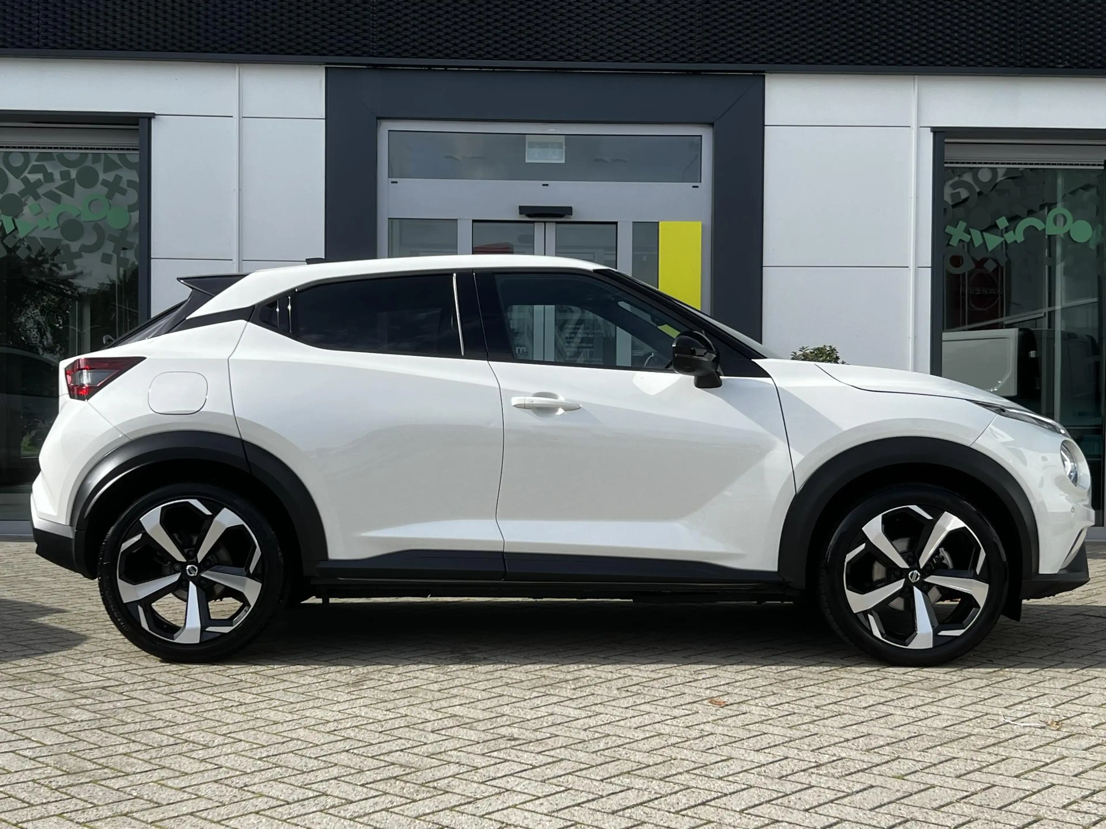 Nissan Juke 1.0 DIG-T Tekna | Trekhaak | BOSE-audio | 360 came — photo 18