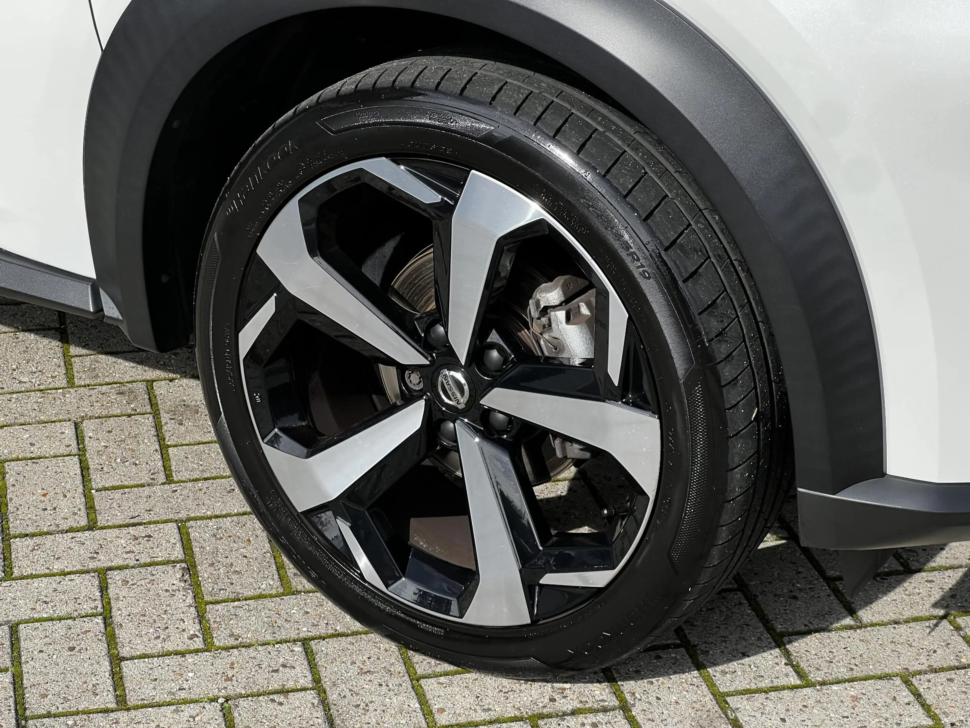 Nissan Juke 1.0 DIG-T Tekna | Trekhaak | BOSE-audio | 360 came — photo 28