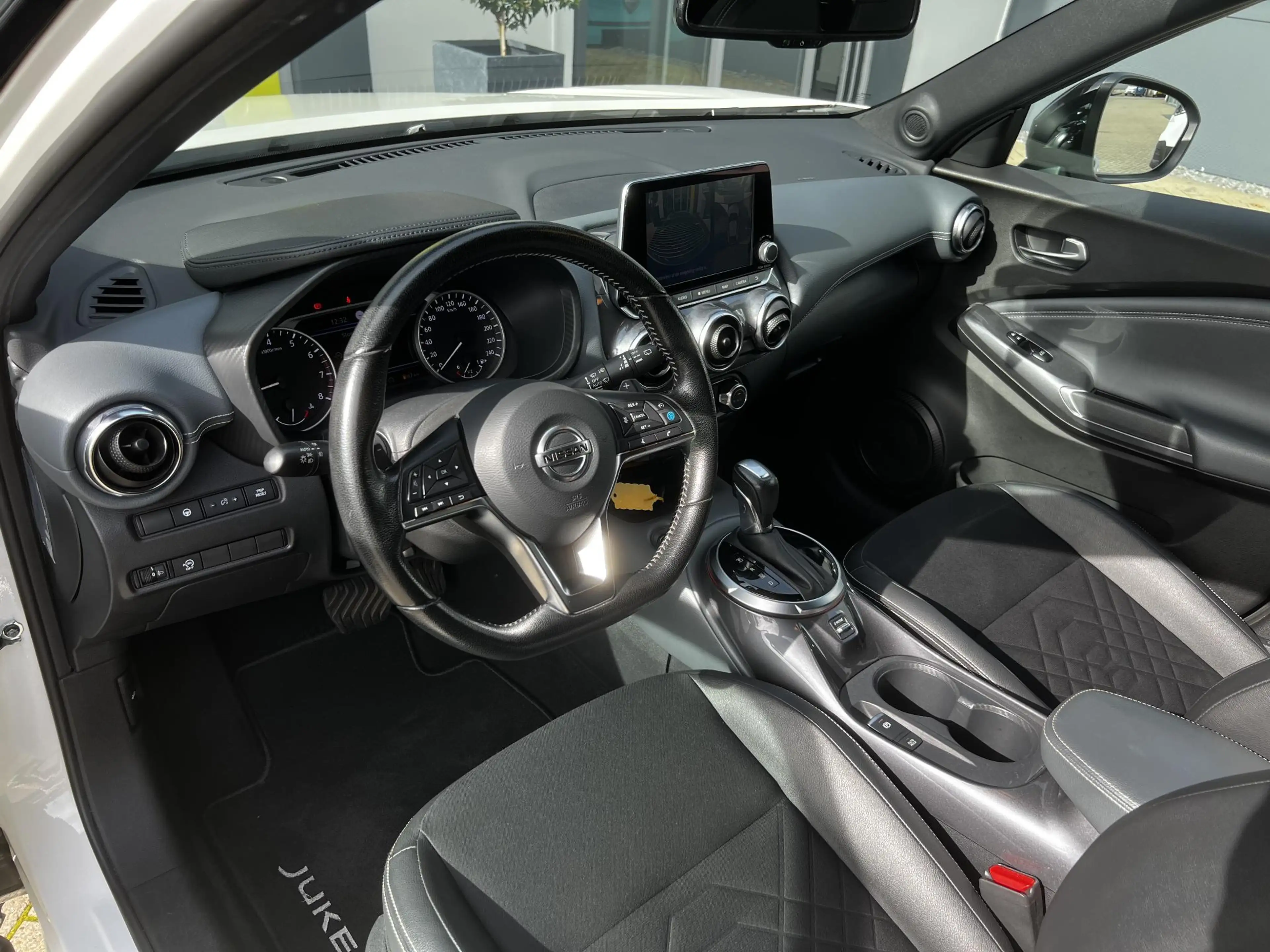 Nissan Juke 1.0 DIG-T Tekna | Trekhaak | BOSE-audio | 360 came — photo 26