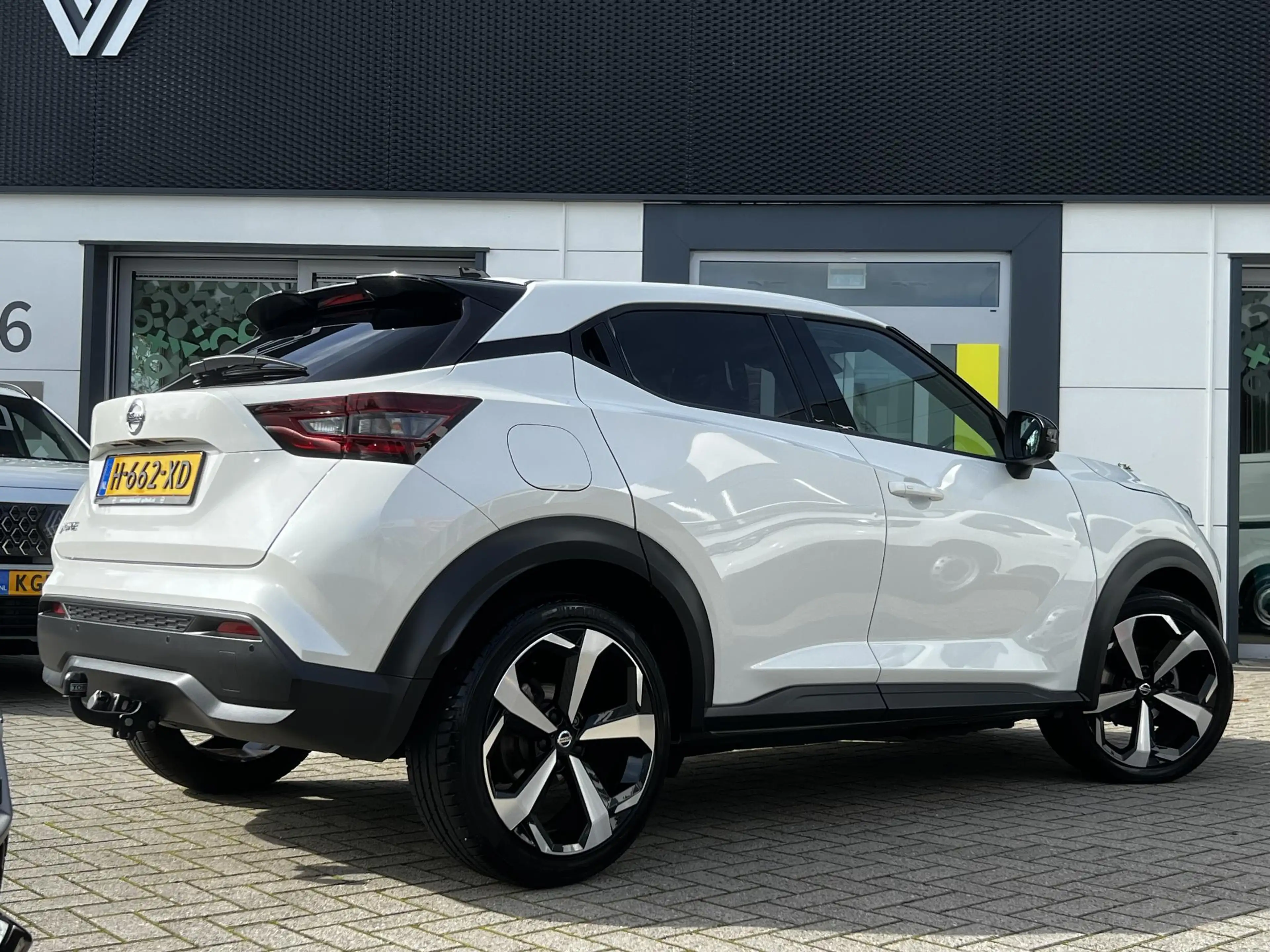 Nissan Juke 1.0 DIG-T Tekna | Trekhaak | BOSE-audio | 360 came — photo 2