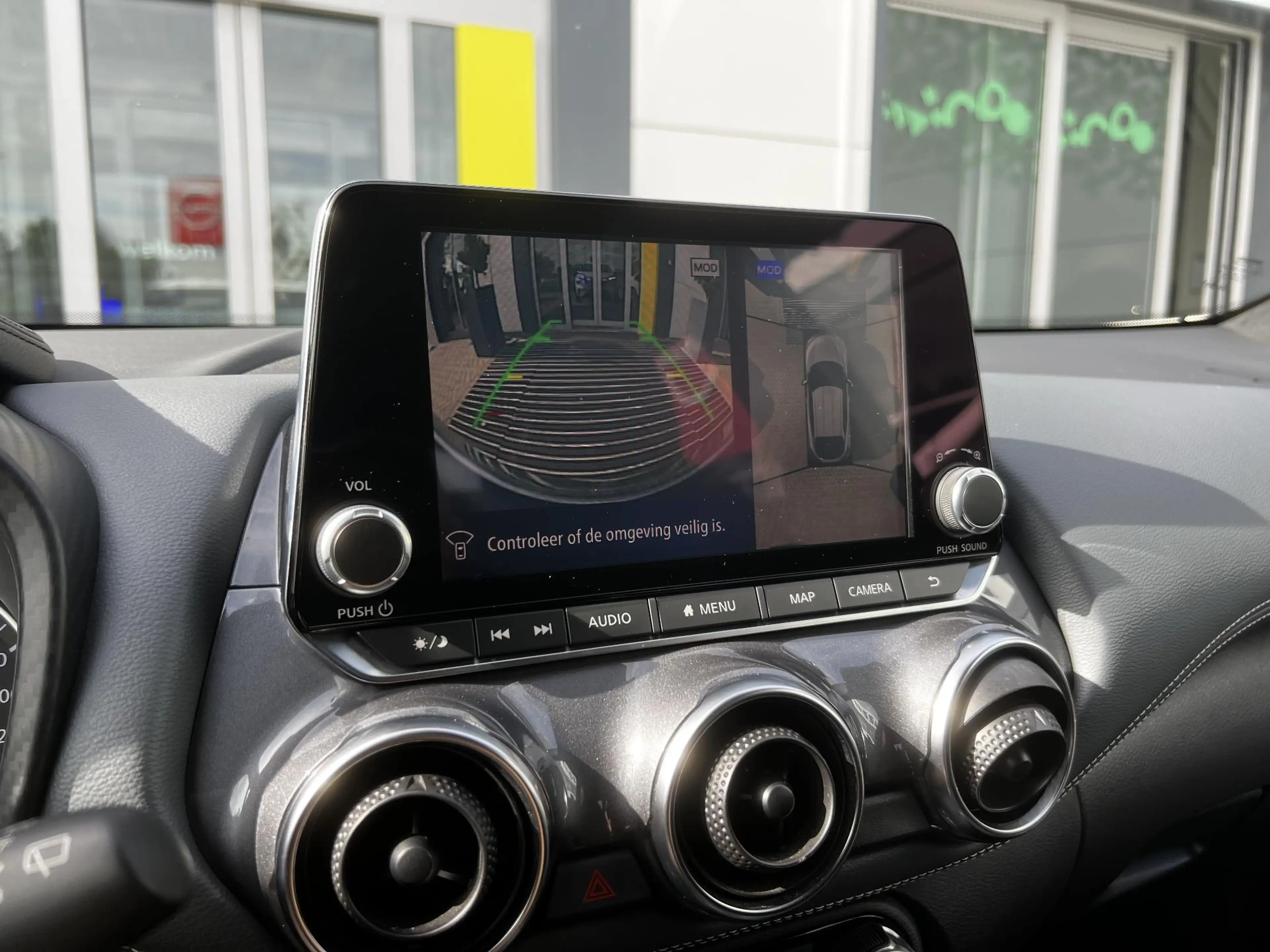 Nissan Juke 1.0 DIG-T Tekna | Trekhaak | BOSE-audio | 360 came — photo 11