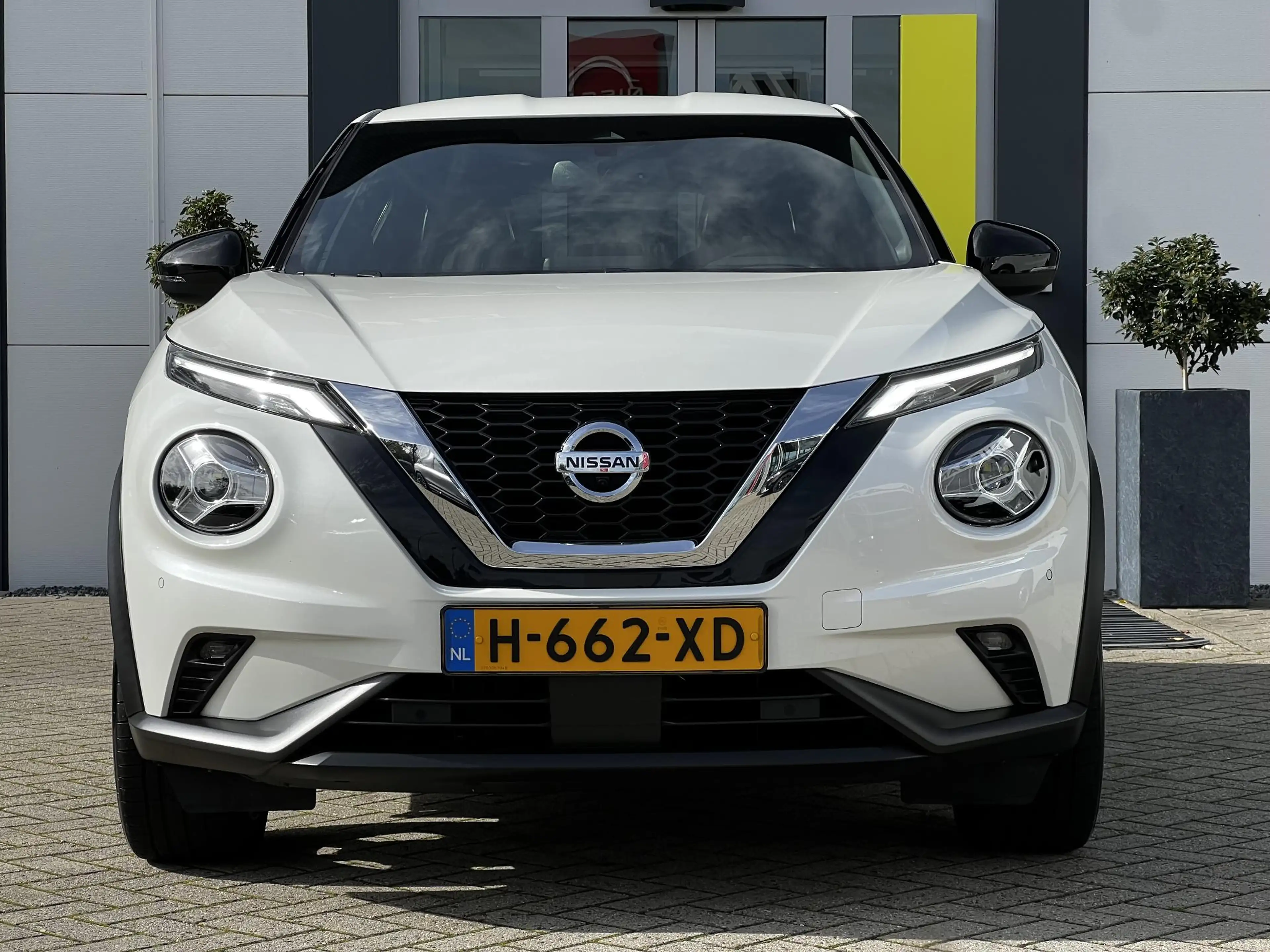 Nissan Juke 1.0 DIG-T Tekna | Trekhaak | BOSE-audio | 360 came — photo 19