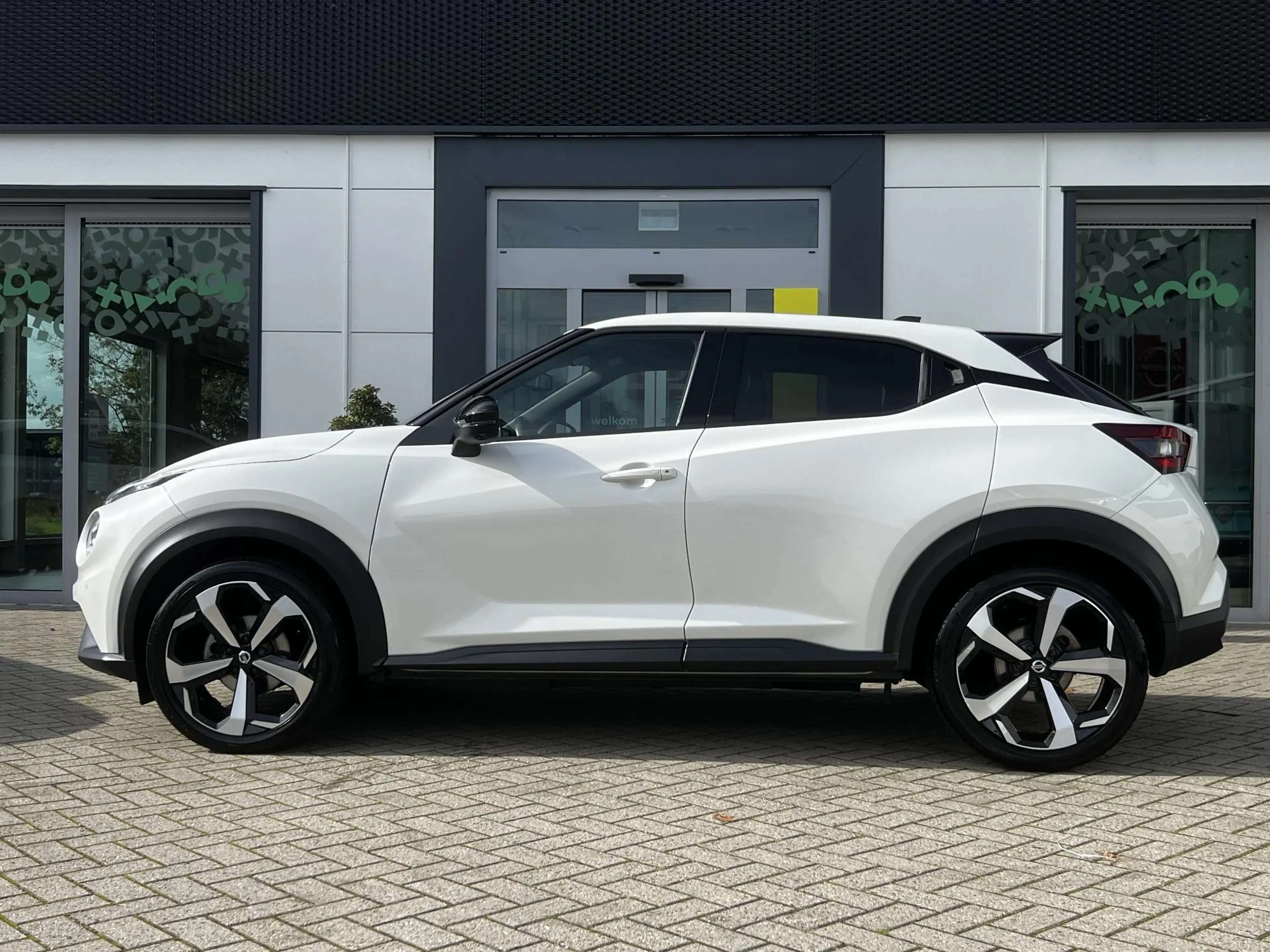Nissan Juke 1.0 DIG-T Tekna | Trekhaak | BOSE-audio | 360 came — photo 17