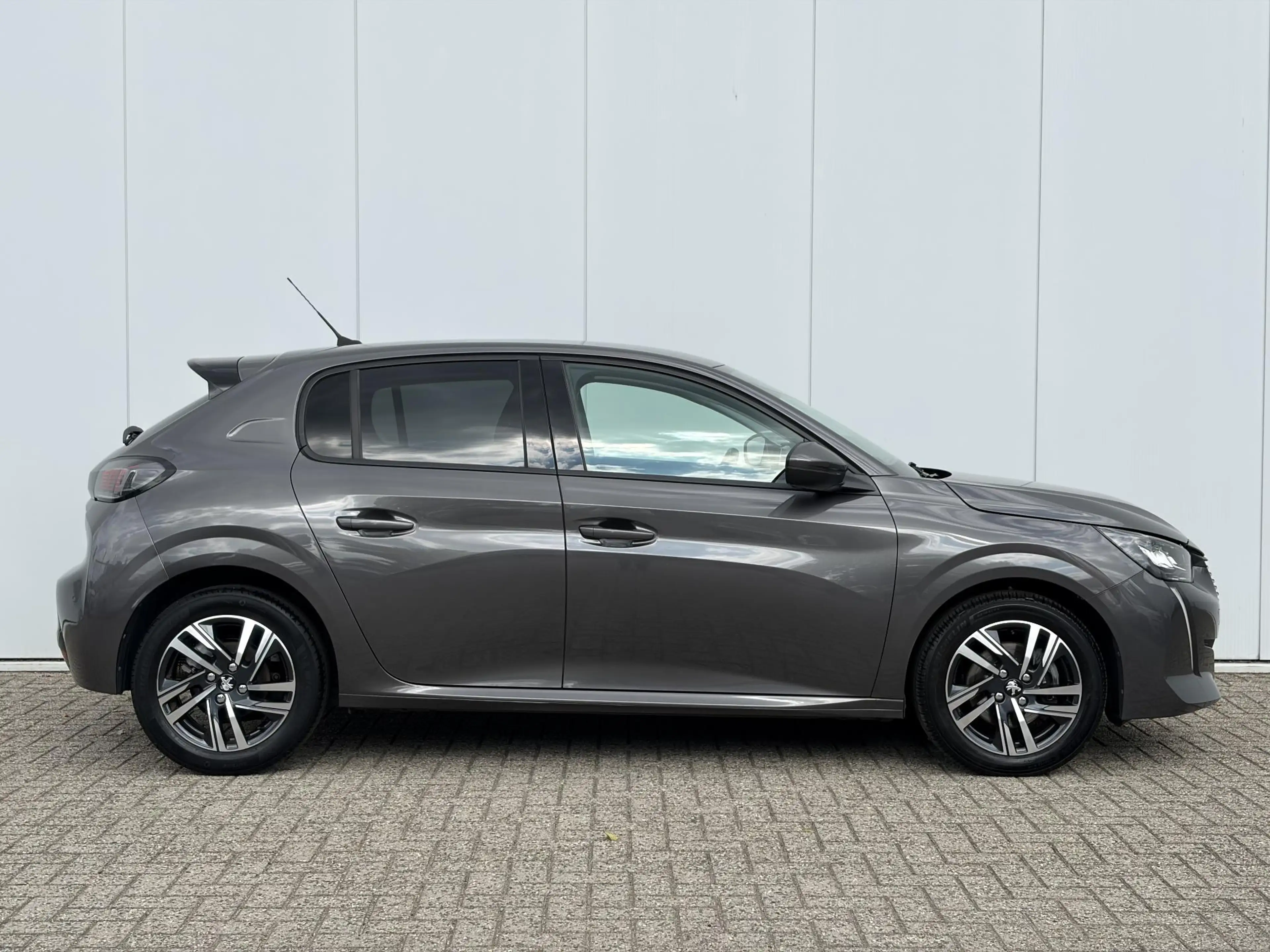 Peugeot 208 1.2 PureTech Allure | Navigatie | Parkeersensoren — photo 4