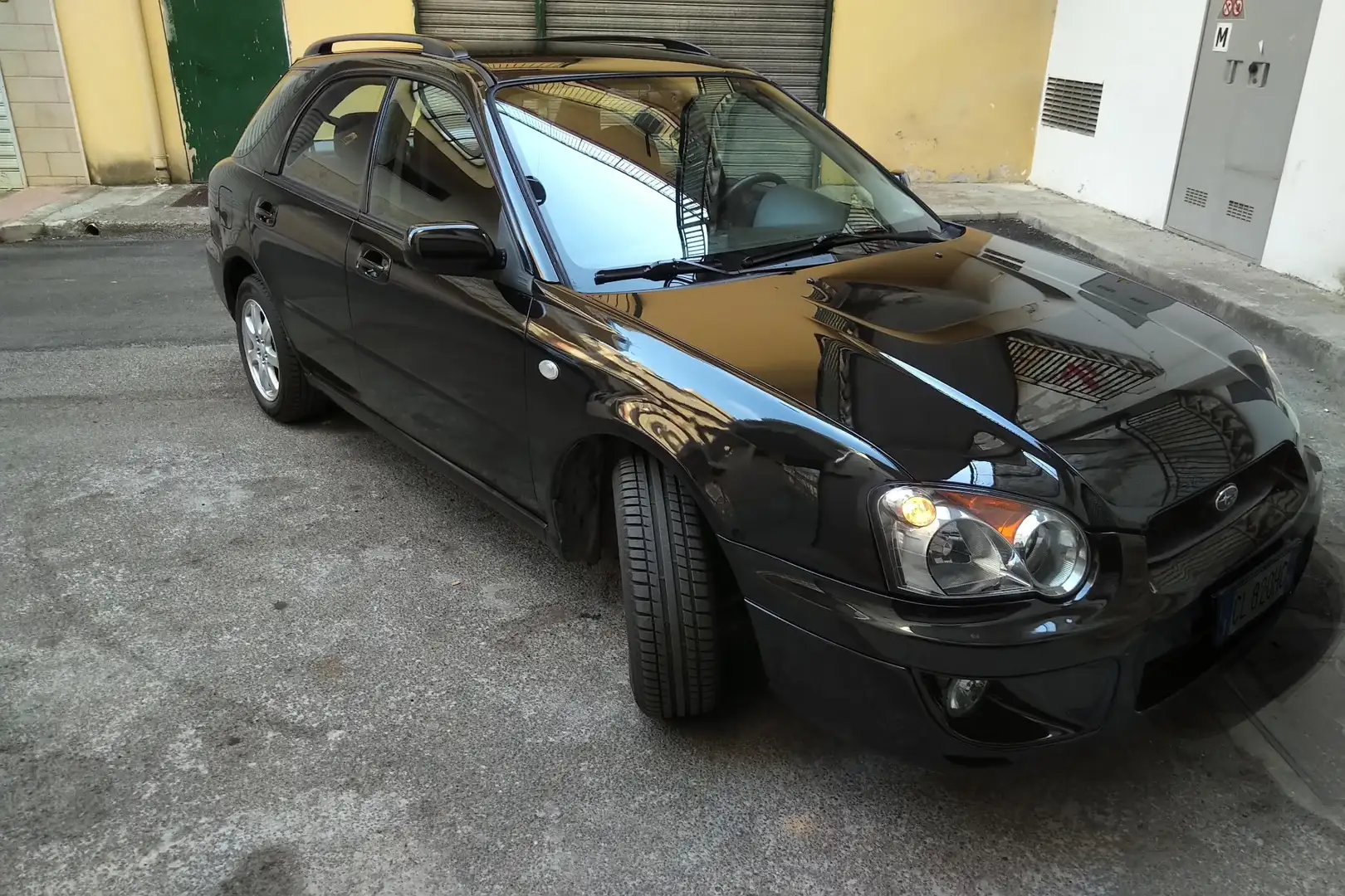 Subaru Impreza SW 2.0i GX bi-fuel awd mt - 1