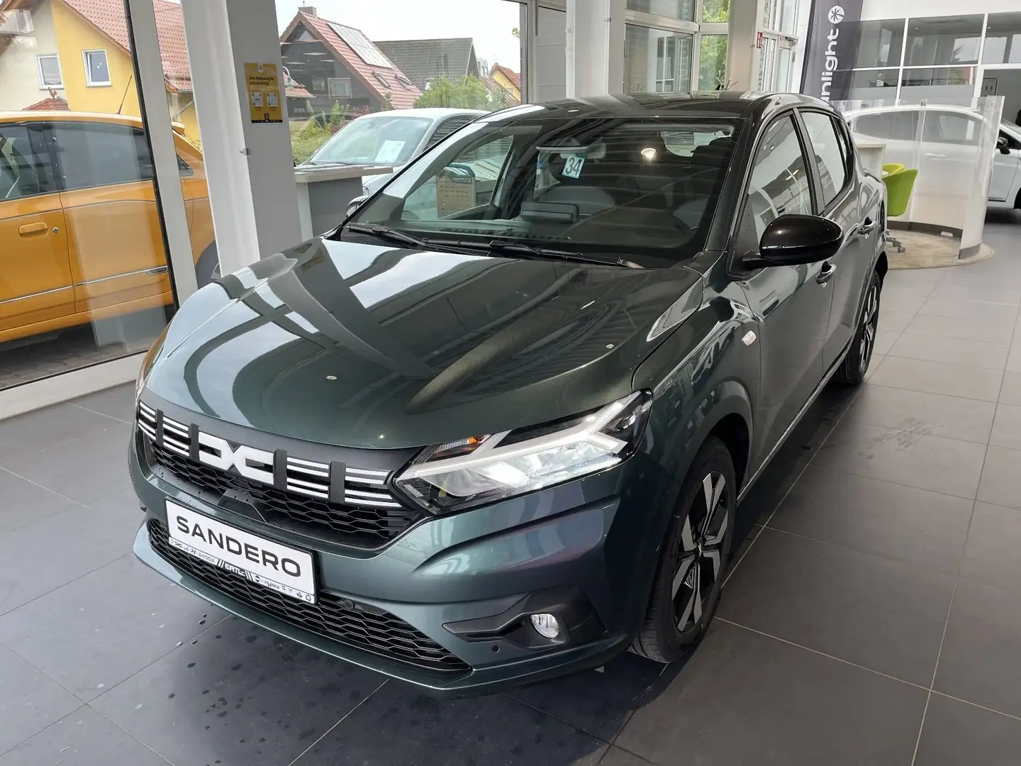 Dacia Sandero Journey TCe 90 *Winterradaktion Grün - 1