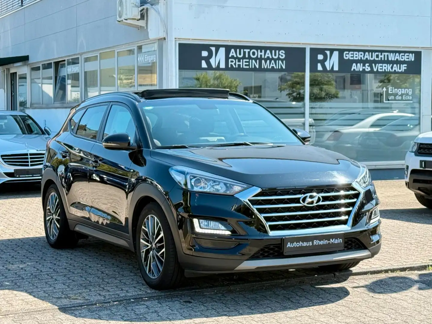 Hyundai TUCSON 1.6 2WD*Aut.*Pano*Nav*Cam*Ahk*Shz*2.Hd Zwart - 1