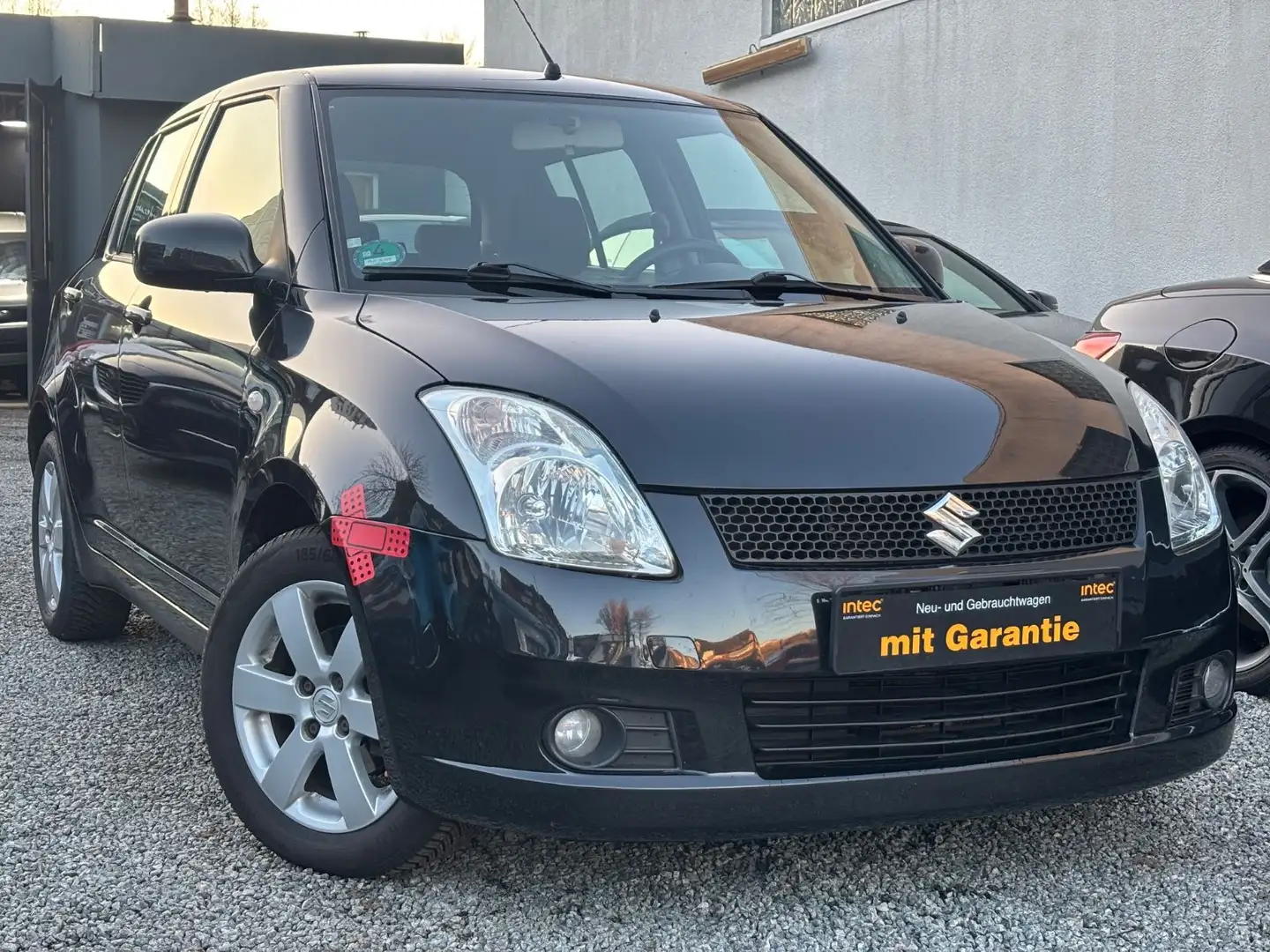 Suzuki Swift Lim. Snow*KEYLESS*SHZ*MFL*KLIMA*ALU*HU NEU Schwarz - 1