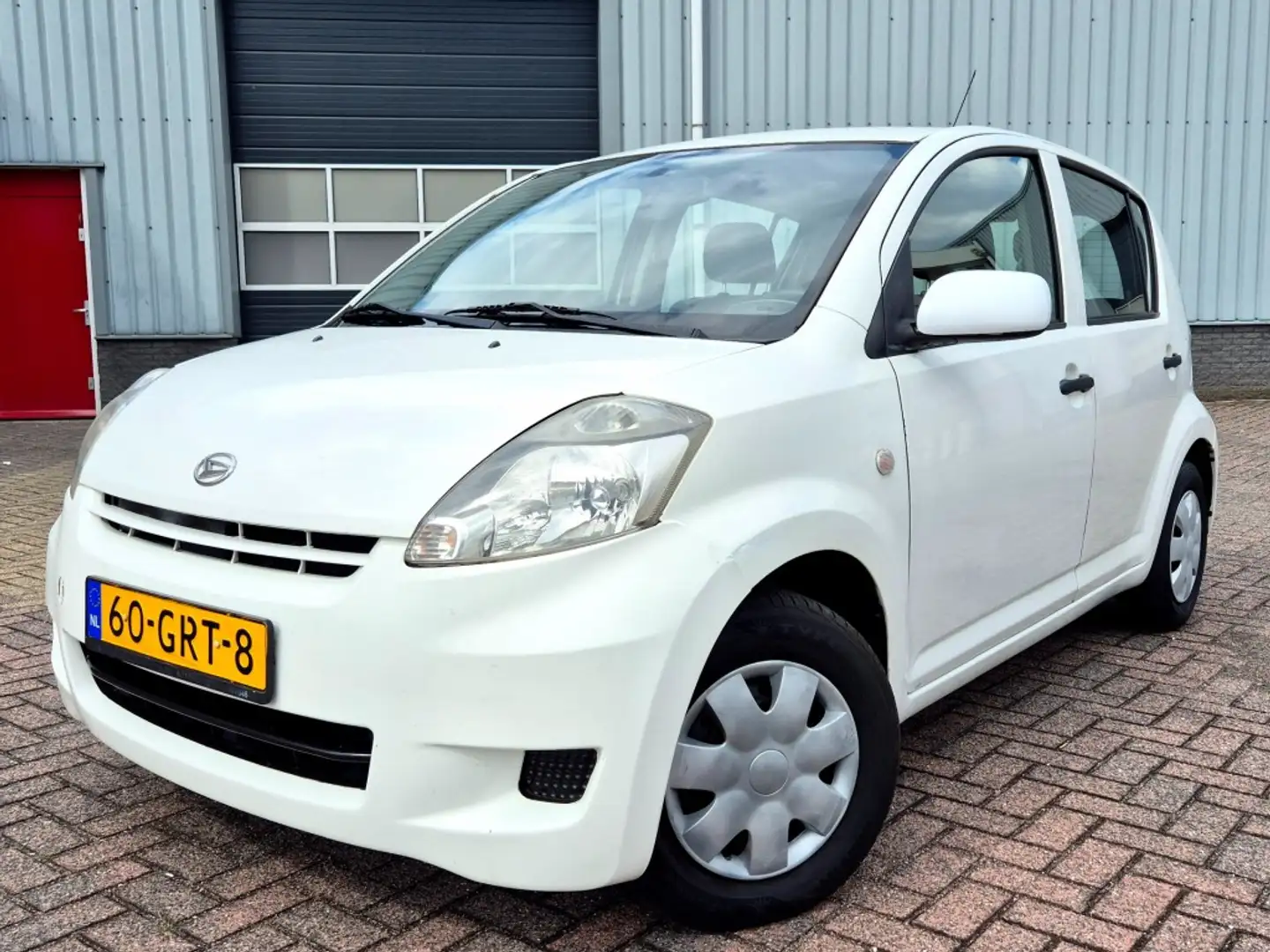 Daihatsu Sirion 1.0 12v Premium Nieuwe APK Blanco - 1