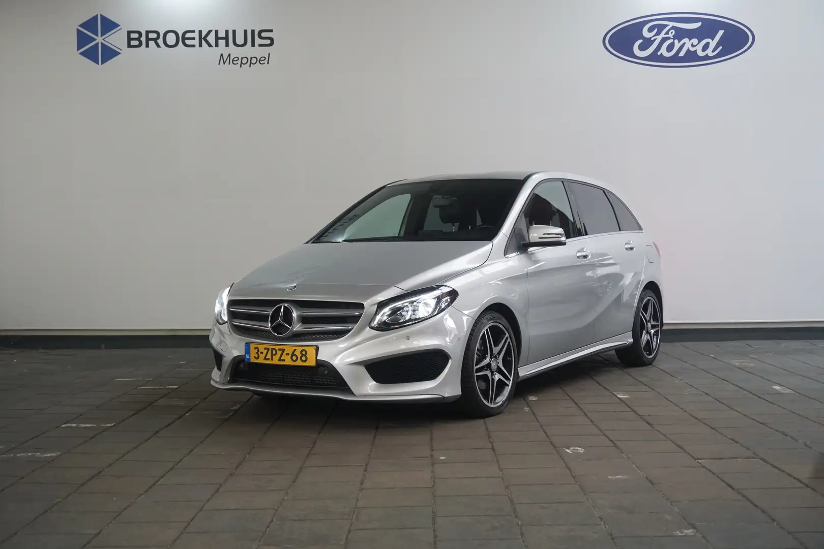 Mercedes-Benz B 180 Ambition AMG-Line | Leder/Alcantara | Trekhaak | Grijs - 1