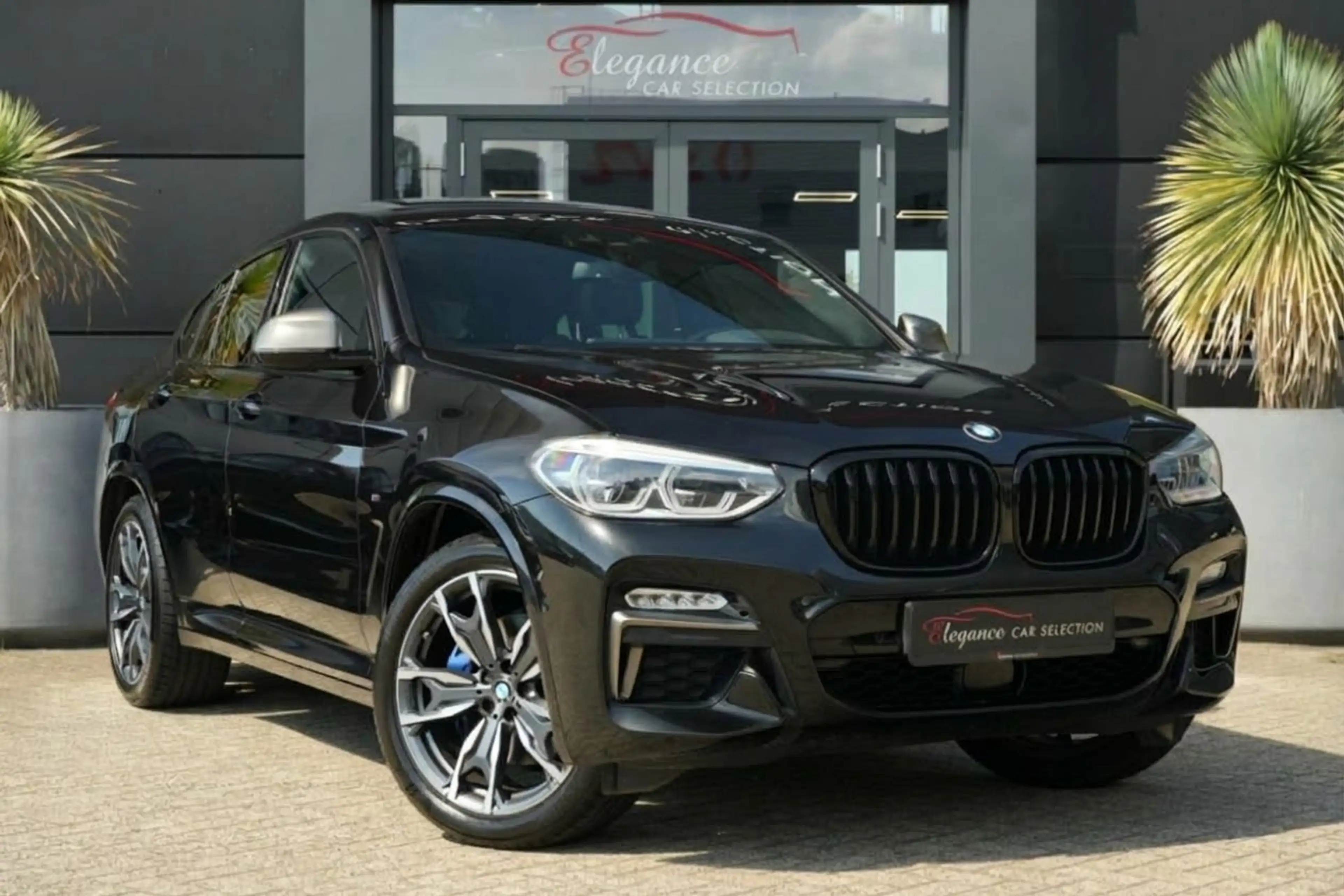 BMW X4 M40i High Executive | 354 PK | Panoramadak | Leder — photo 8