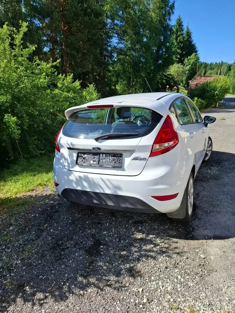 Ford Fiesta Ghia 1,25 - 2