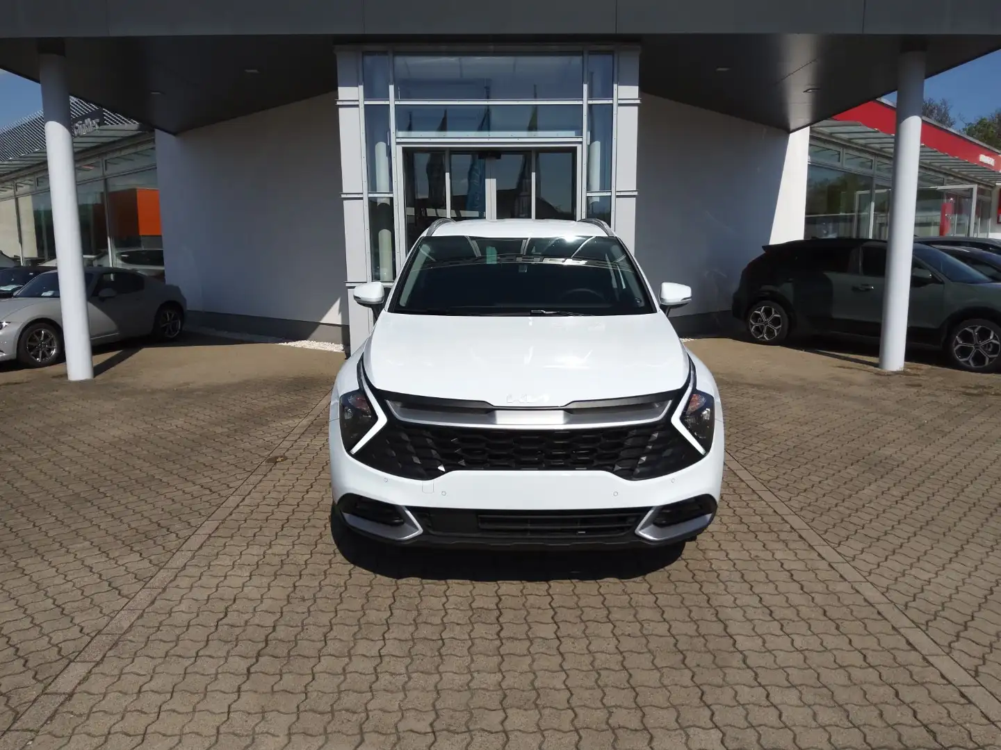 Kia Sportage Vision 1.6T Hybrid AWD KOM Weiß - 1