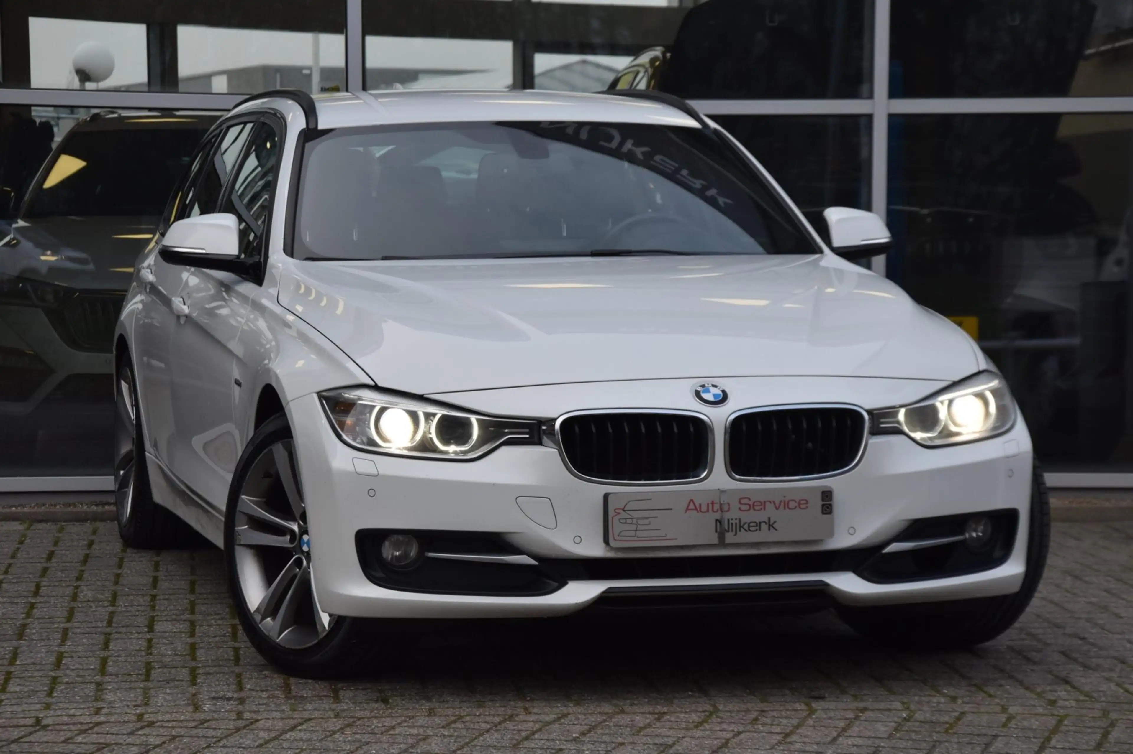 BMW 316 3-serie Touring 316i High Executive Aut. Sport Led