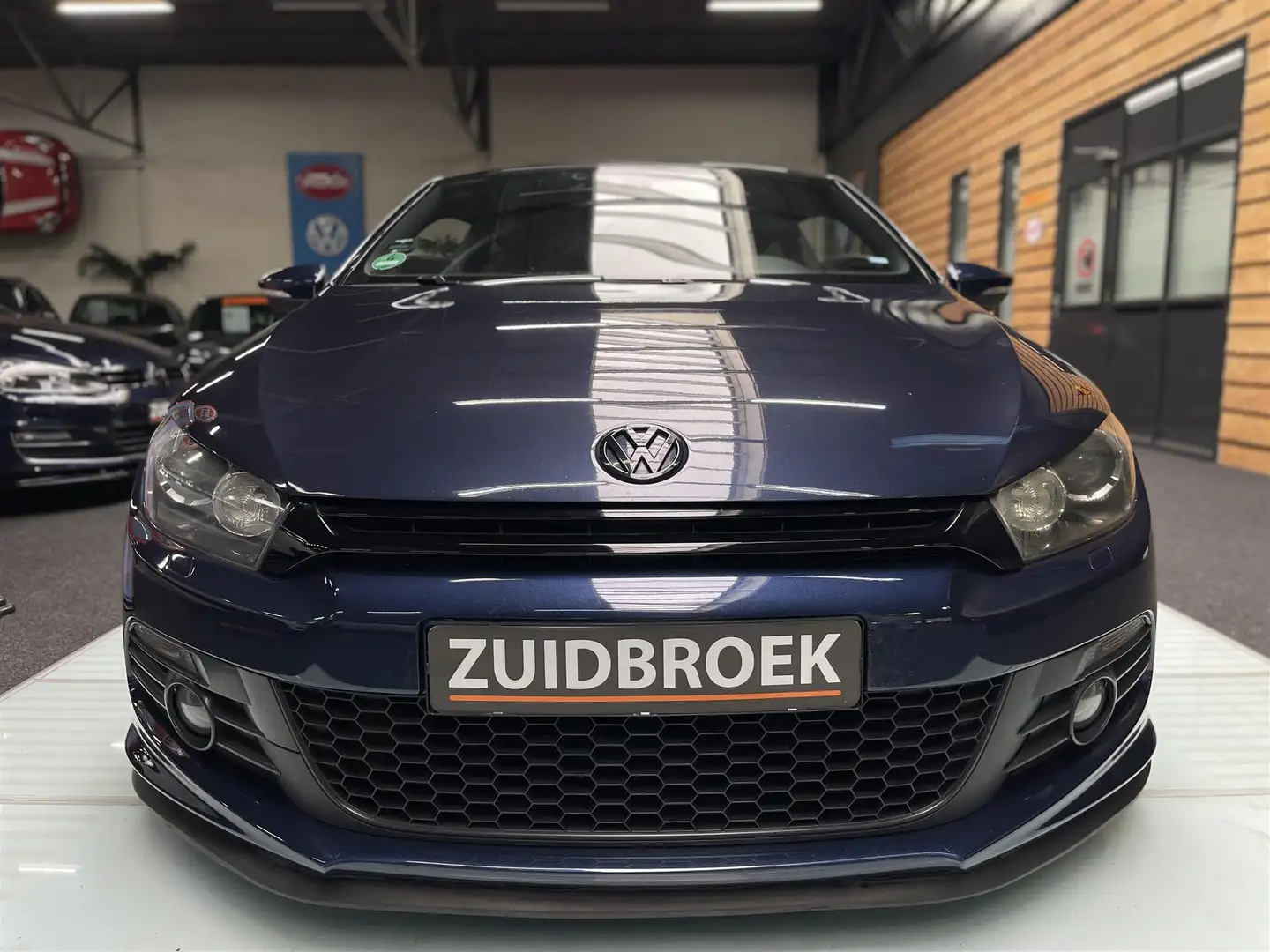 Volkswagen Scirocco 2.0 TSI UNIEK!! 105DKM!! Cruise!! Clima!! Navi!! Blauw - 2