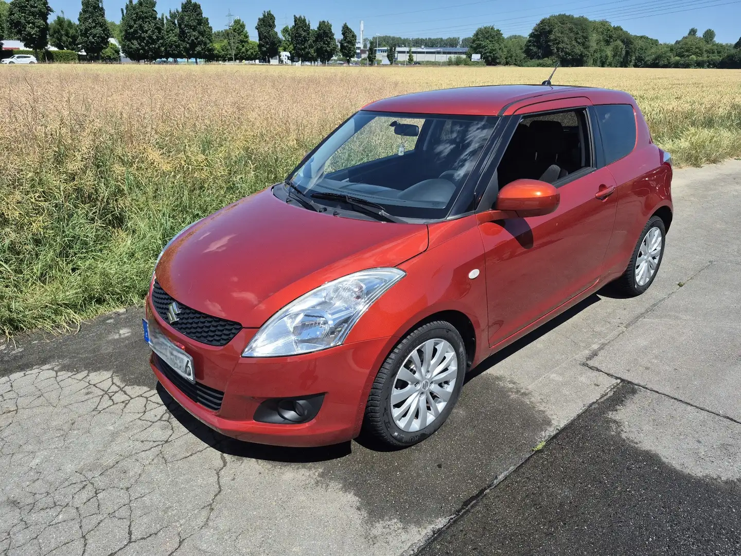 Suzuki Swift 1.2 Comfort Orange - 1