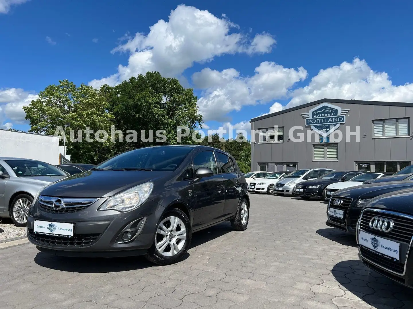 Opel Corsa D 150 Jahre Opel/S-Heft/Winterpaket/Klima Gris - 1