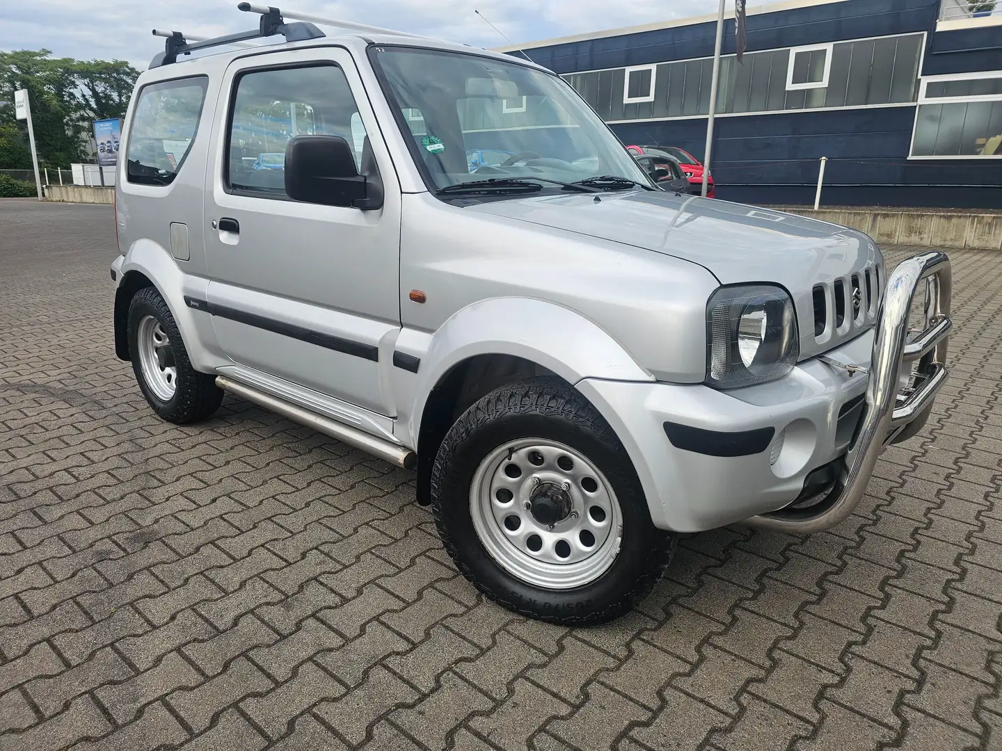 Suzuki Jimny Ranger,Klima,AHK,4*4 Allrad,ZV,el.Fenst,Tüv Neu Zilver - 1