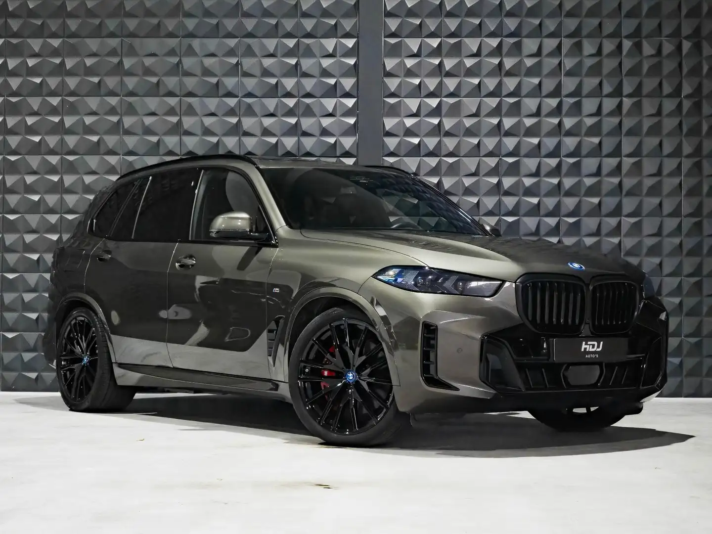 BMW X5 xDrive50e |Pano | 21"| Trekh. | H/K | Servo | Icon Grijs - 1