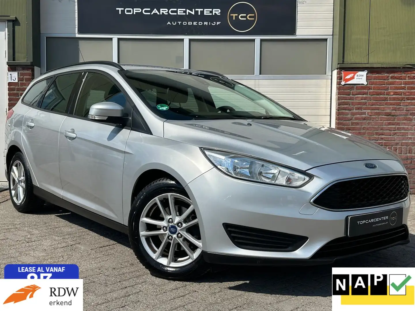 Ford Focus Wagon 1.0 Edition/TREKH/NAVI/PARKS/CRUISE/APK/NAP Grijs - 1