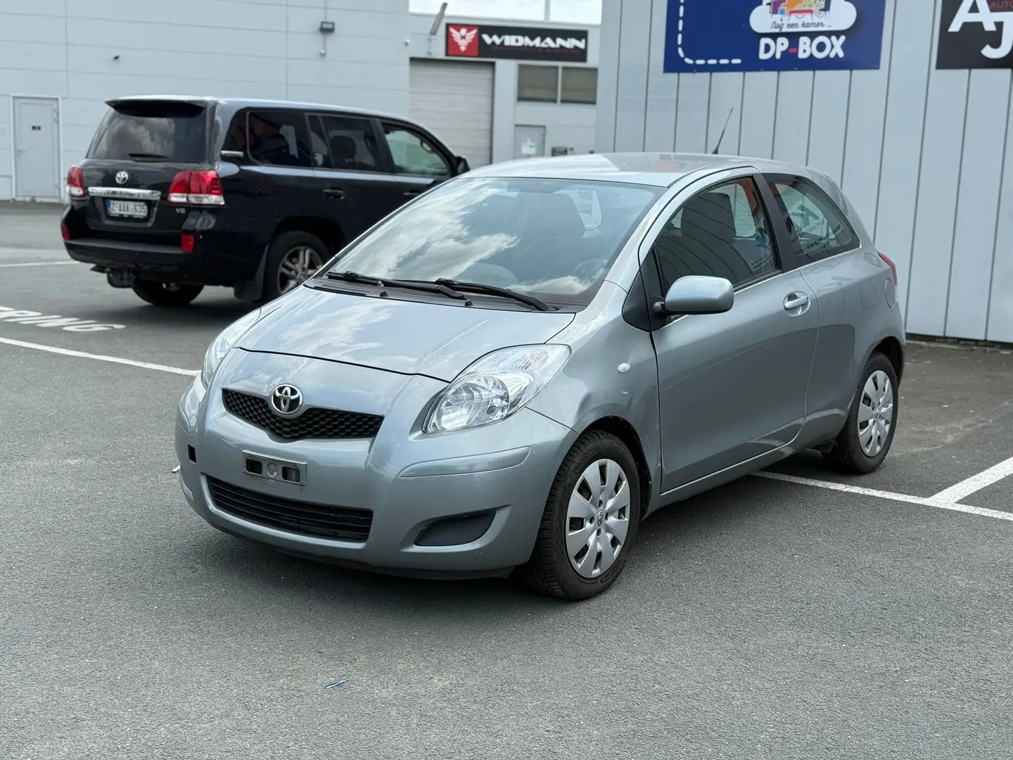 Toyota Yaris 1.33i VVT-i Luna MOTOR GELUID Grijs - 1