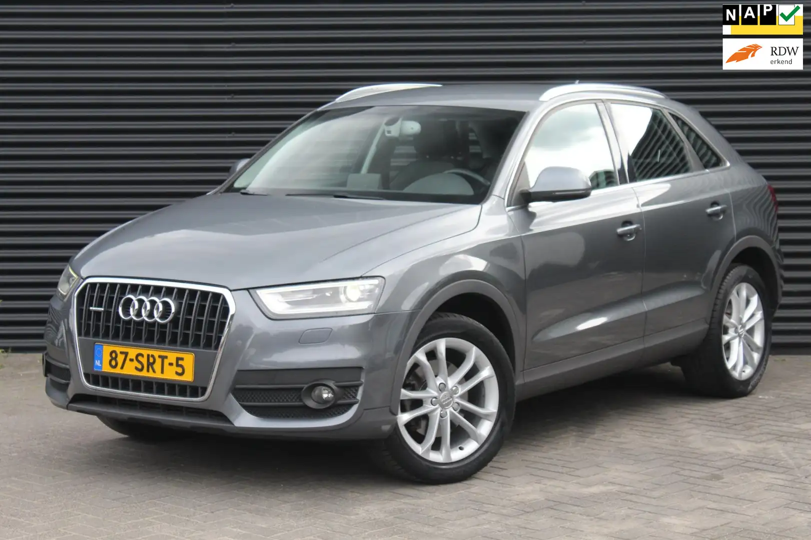 Audi Q3 2.0 TFSI quattro | Trekhaak | Xenon | Cruise | Sto Grau - 1