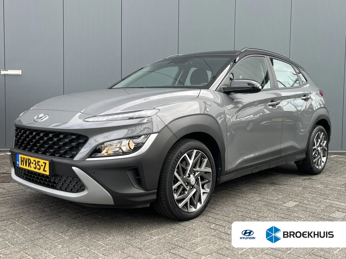 Hyundai KONA 1.6 GDI 140pk HEV Comfort Smart | Camera | Climate Grijs - 1