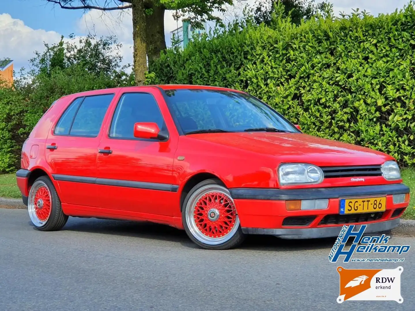 Volkswagen Golf 1.8 Milestone met muziekinstallatie Rood - 1