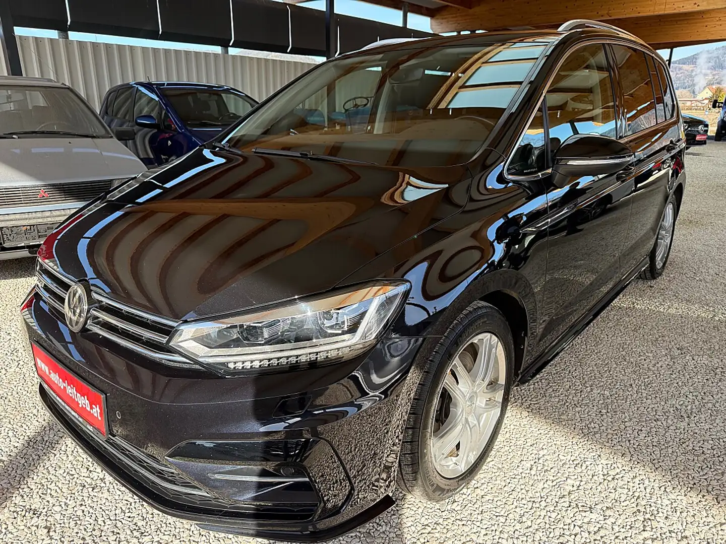 Volkswagen Touran 1,5 TSI ACT Highline 7 Sitze DSG R-Line Schwarz - 1