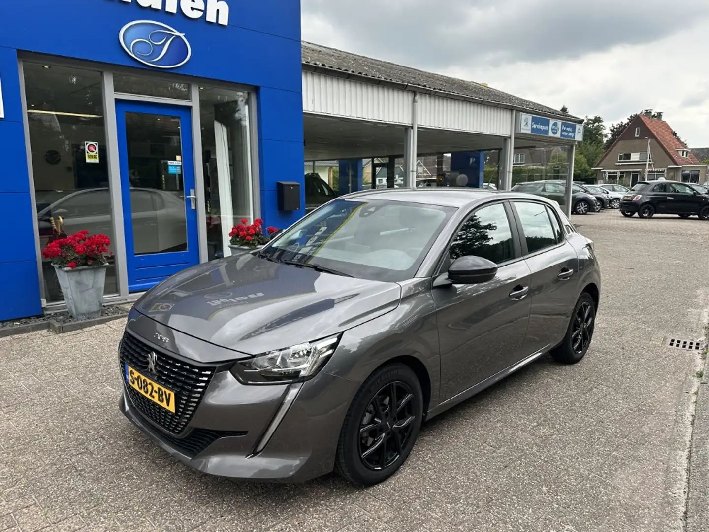 Peugeot 208 1.2 PT Active Pack Grijs - 1