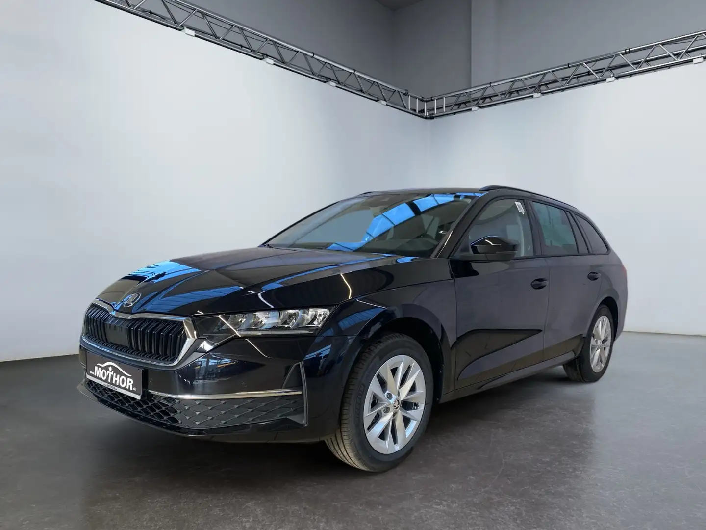 Skoda Octavia Combi Selection 2.0 TDI DSG Navigation Schwarz - 2