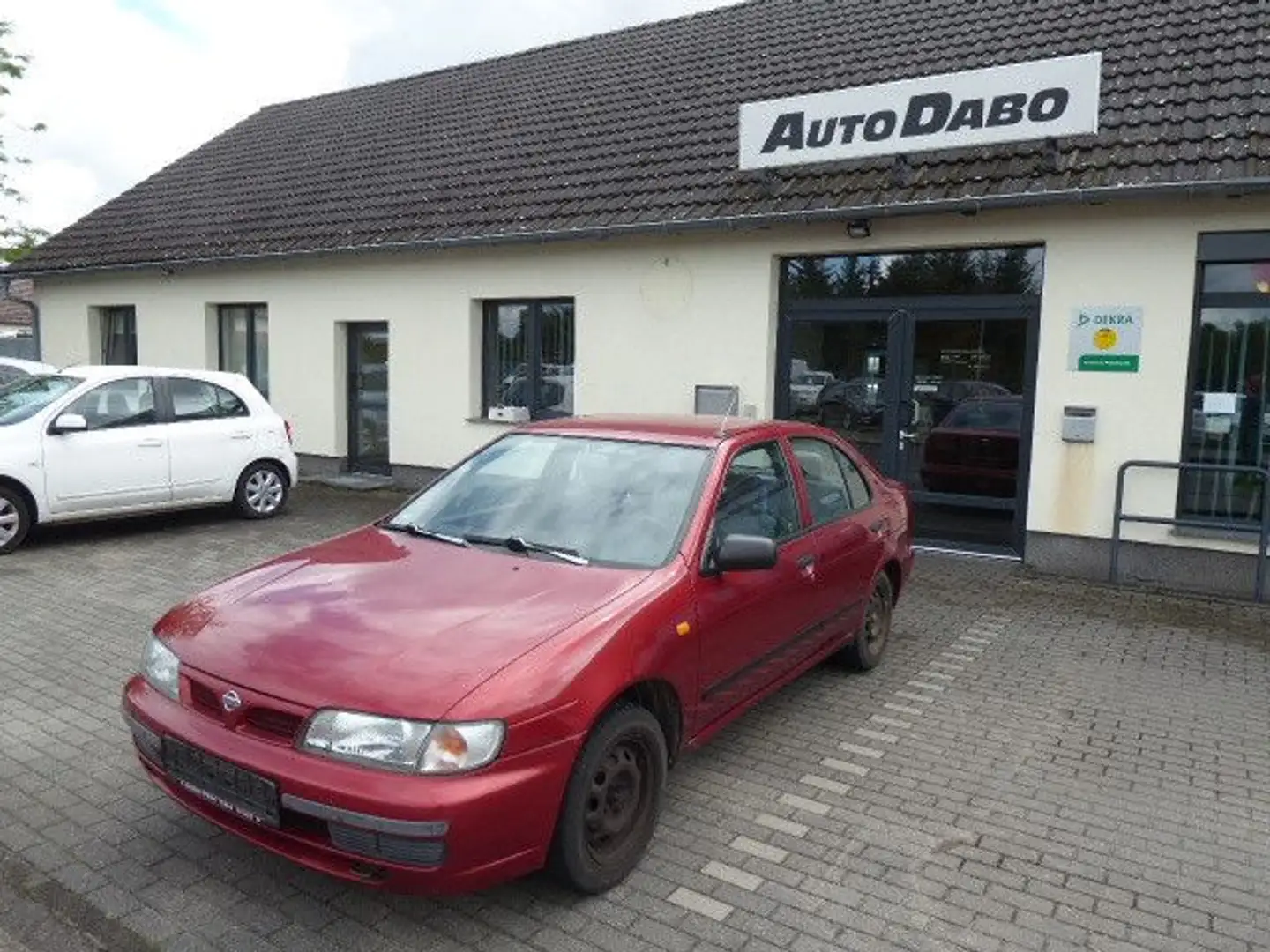 Nissan Almera 1.4 Classic Rouge - 1