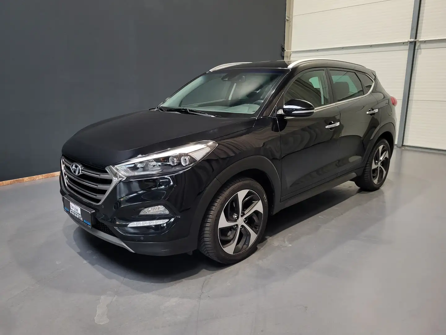 Hyundai TUCSON 1.6GDI Trend 4WD *Navi| LED| Kamera* Schwarz - 1
