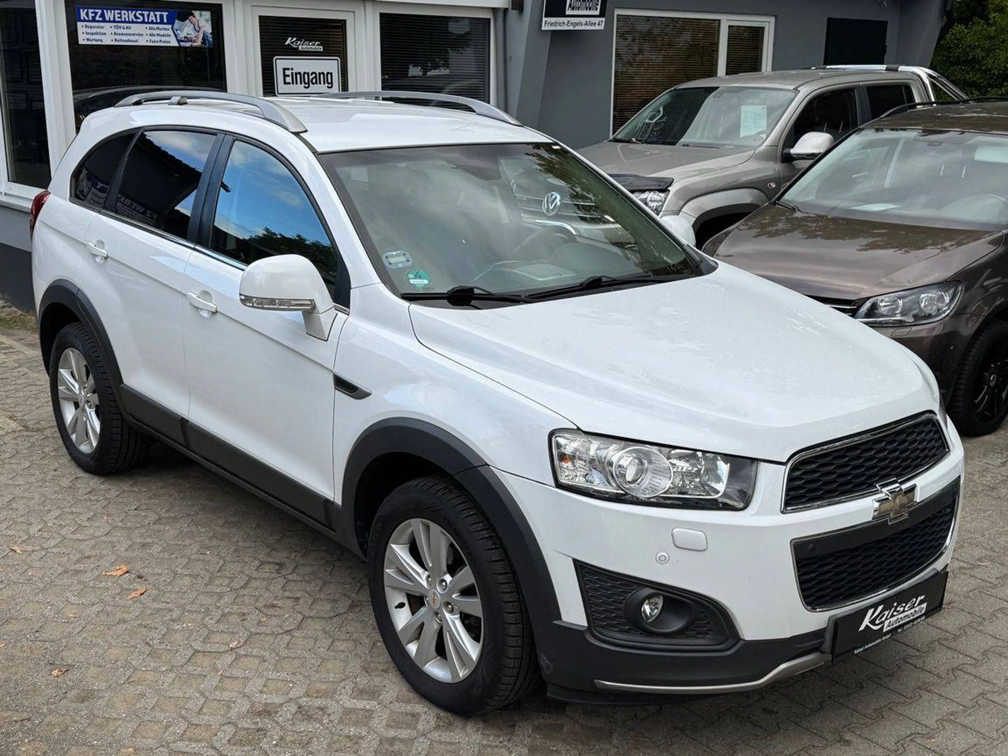 Chevrolet Captiva 2.2 D LT-1.Besitz-7Sitzer-Leder-Navi-AHK-Allwetter v.26 — photo 3