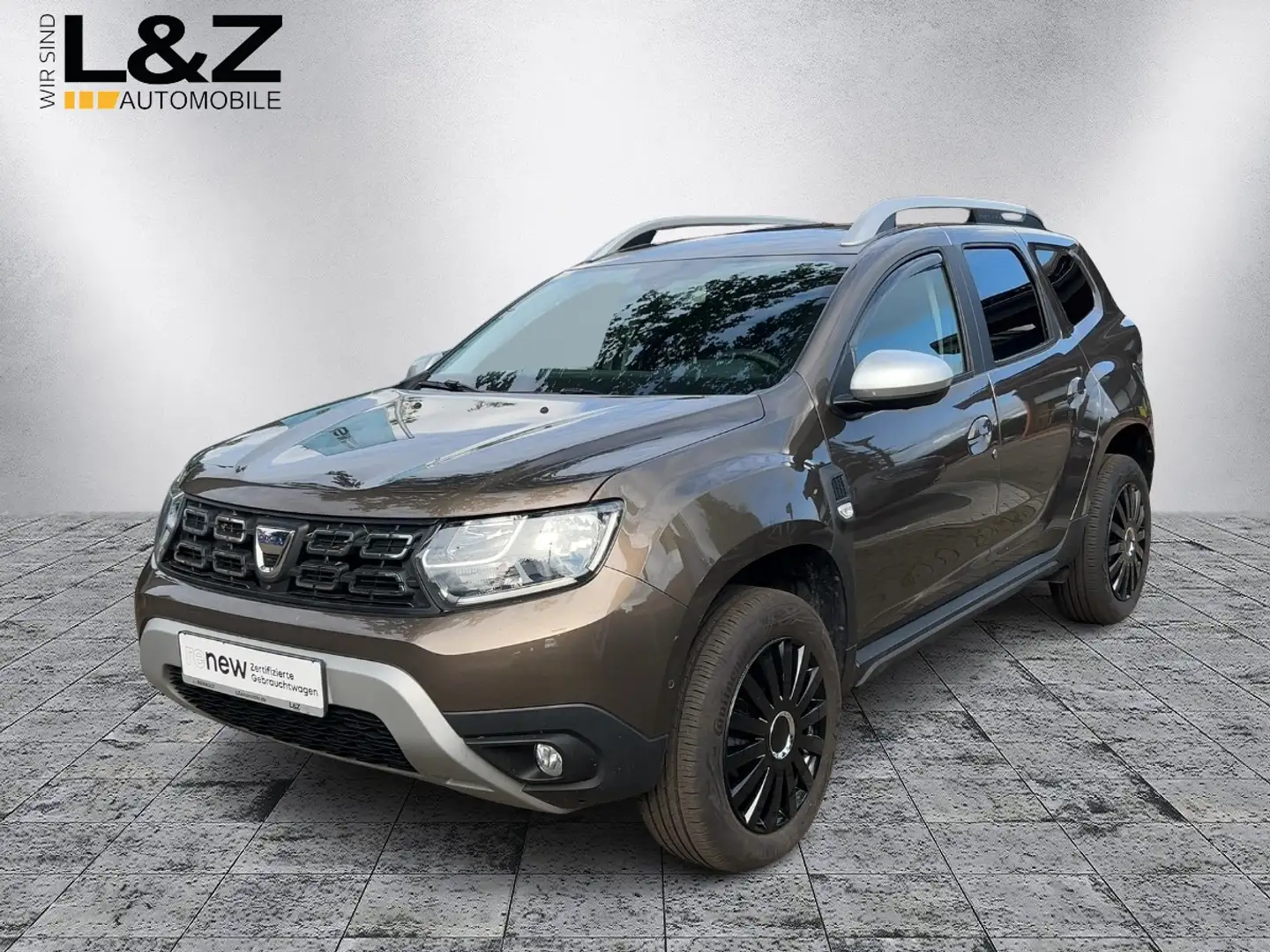 Dacia Duster SCe 115 Prestige *Navi,PDC,SHZ* Braun - 1