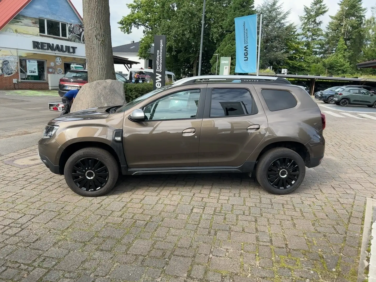 Dacia Duster SCe 115 Prestige *Navi,PDC,SHZ* Braun - 2