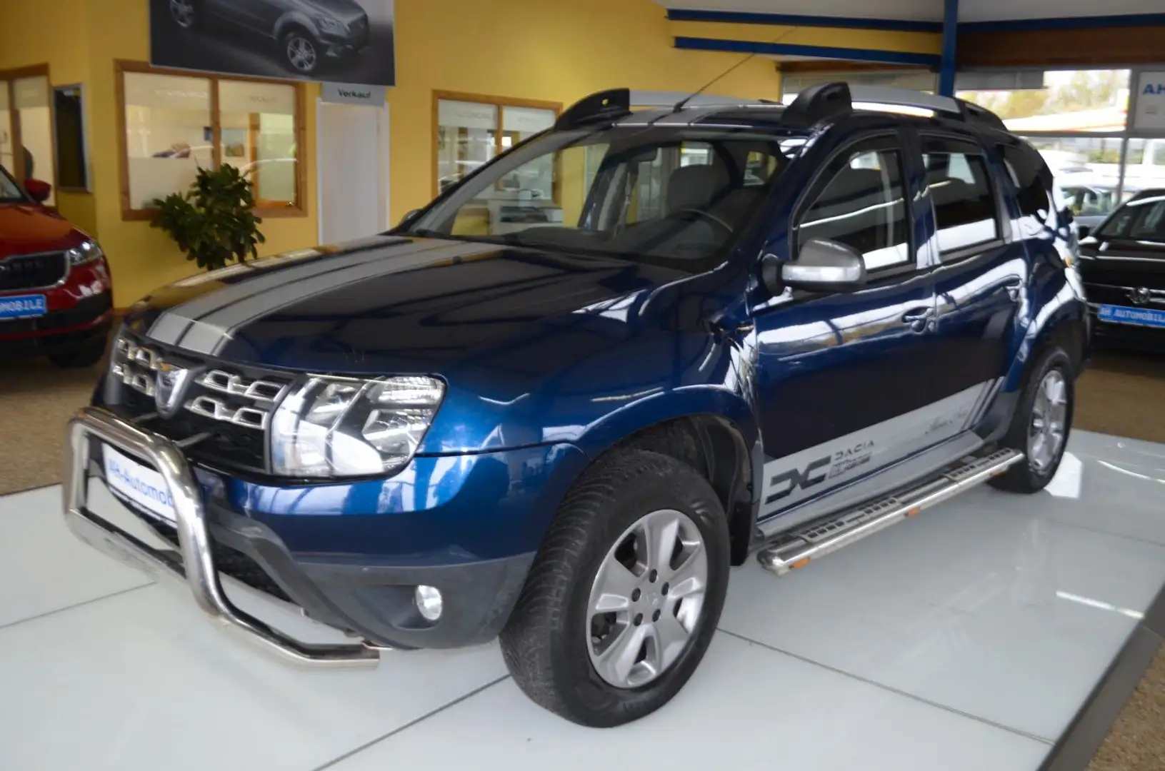 Dacia Duster I Prestige 4x2 AUTOMATIK / NAVI / R-KAM Blau - 1