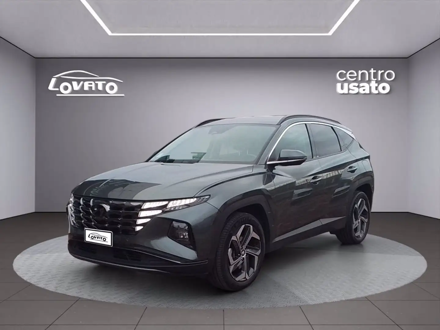 Hyundai TUCSON NEW 1.6HEV AT 230 EXELLENCE 21 Gris - 1