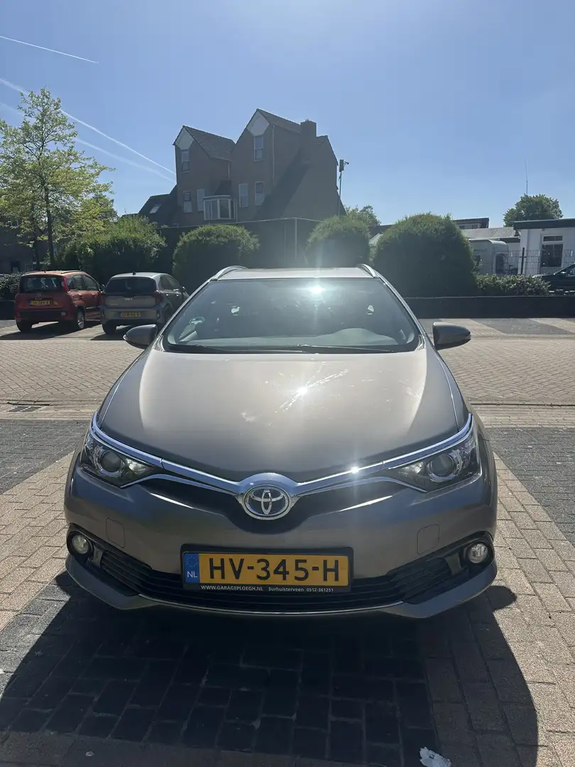 Toyota Auris 1.8 Hybr. Toyota touring sport Brun - 1