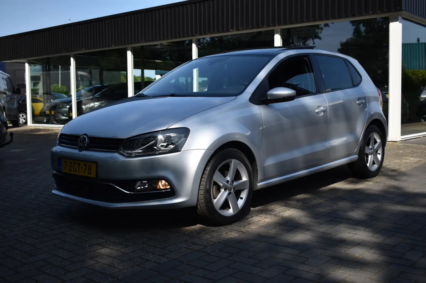 Volkswagen Polo 1.2 TSI Highline CLIMA CRUISE NAVI PDC SCHUIFDAK Grijs - 1