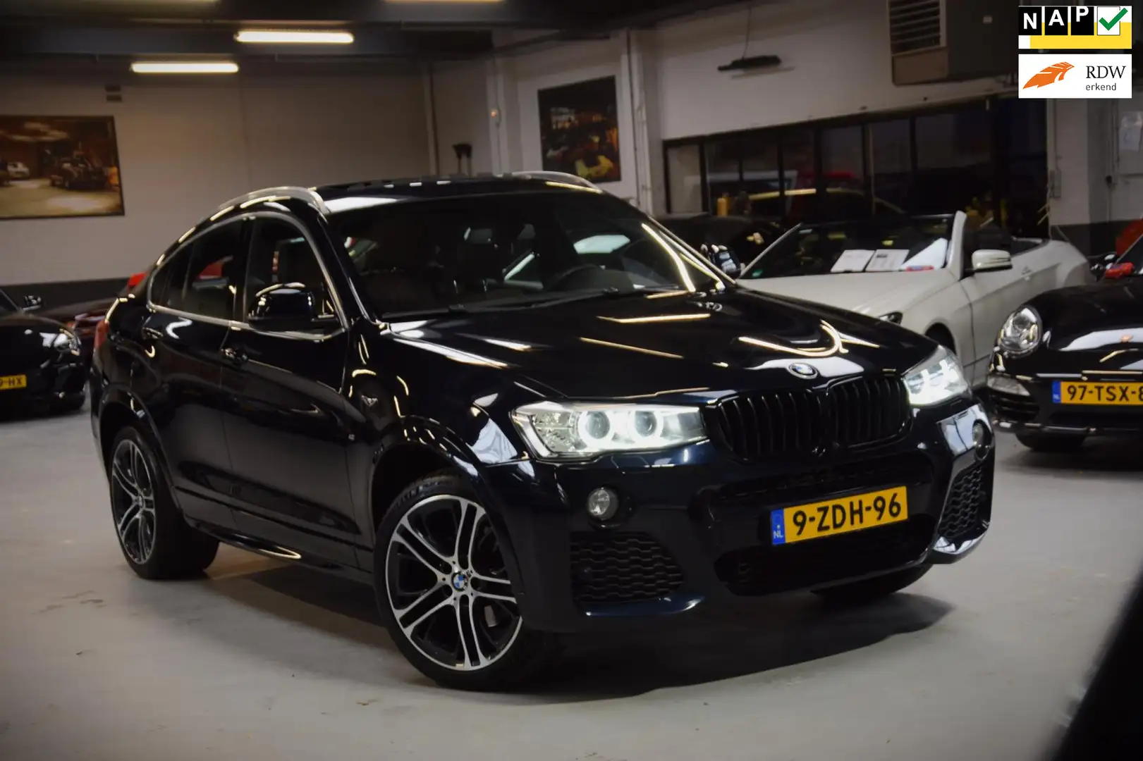 BMW X4 XDrive20i High Executive M-Pakket|Navi|Leder|Schui Zwart - 1