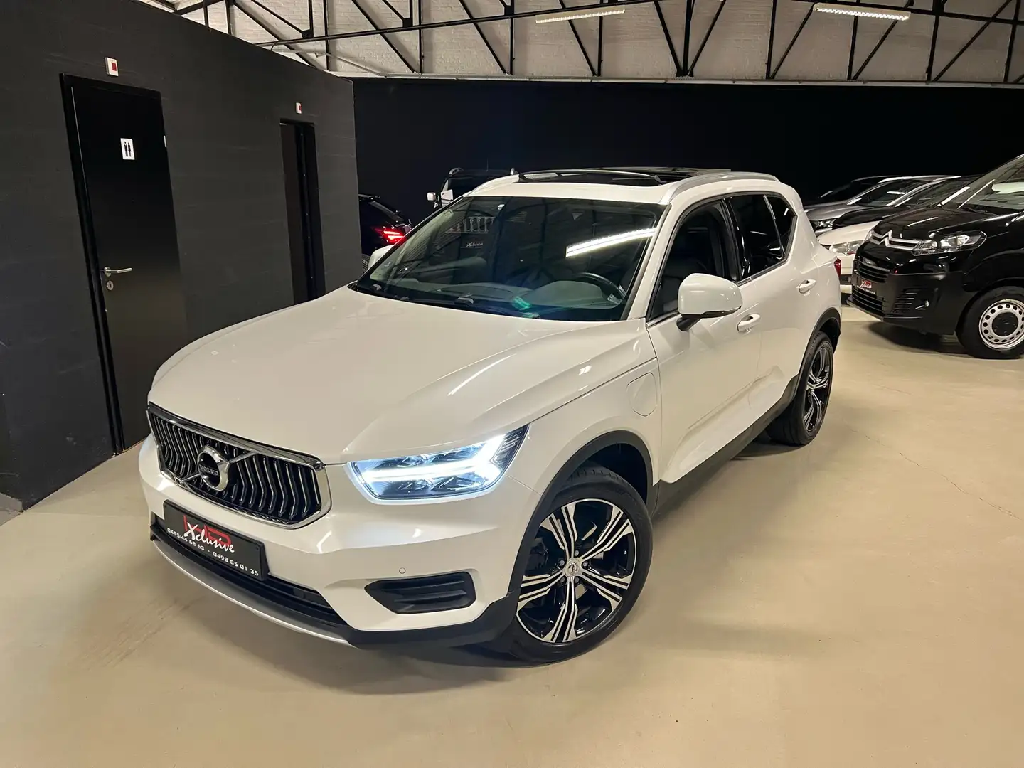Volvo XC40 1.5 T4 PHEV R *FULL*PANO*GPS*CUIR*CAMERA*GARANTIE* Weiß - 1