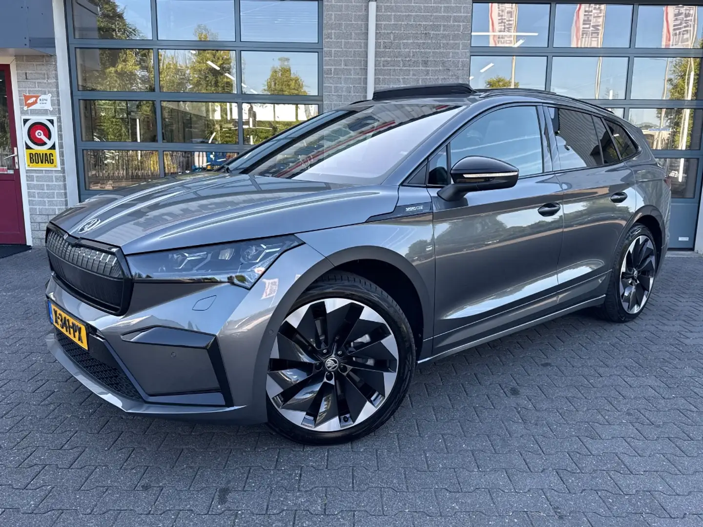 Skoda Enyaq iV 80X Sportline | Trekhaak | VOL | Grijs - 1