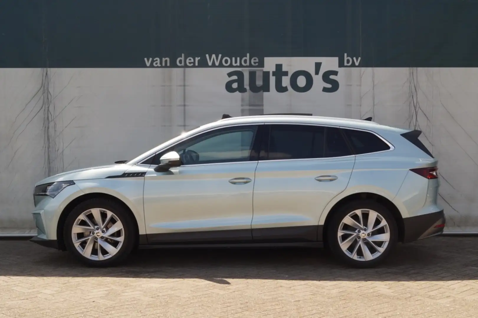 Skoda Enyaq iV 60 180pk 62kWh -PANO-LEER-NAVI-ECC-PDC- Grijs - 1