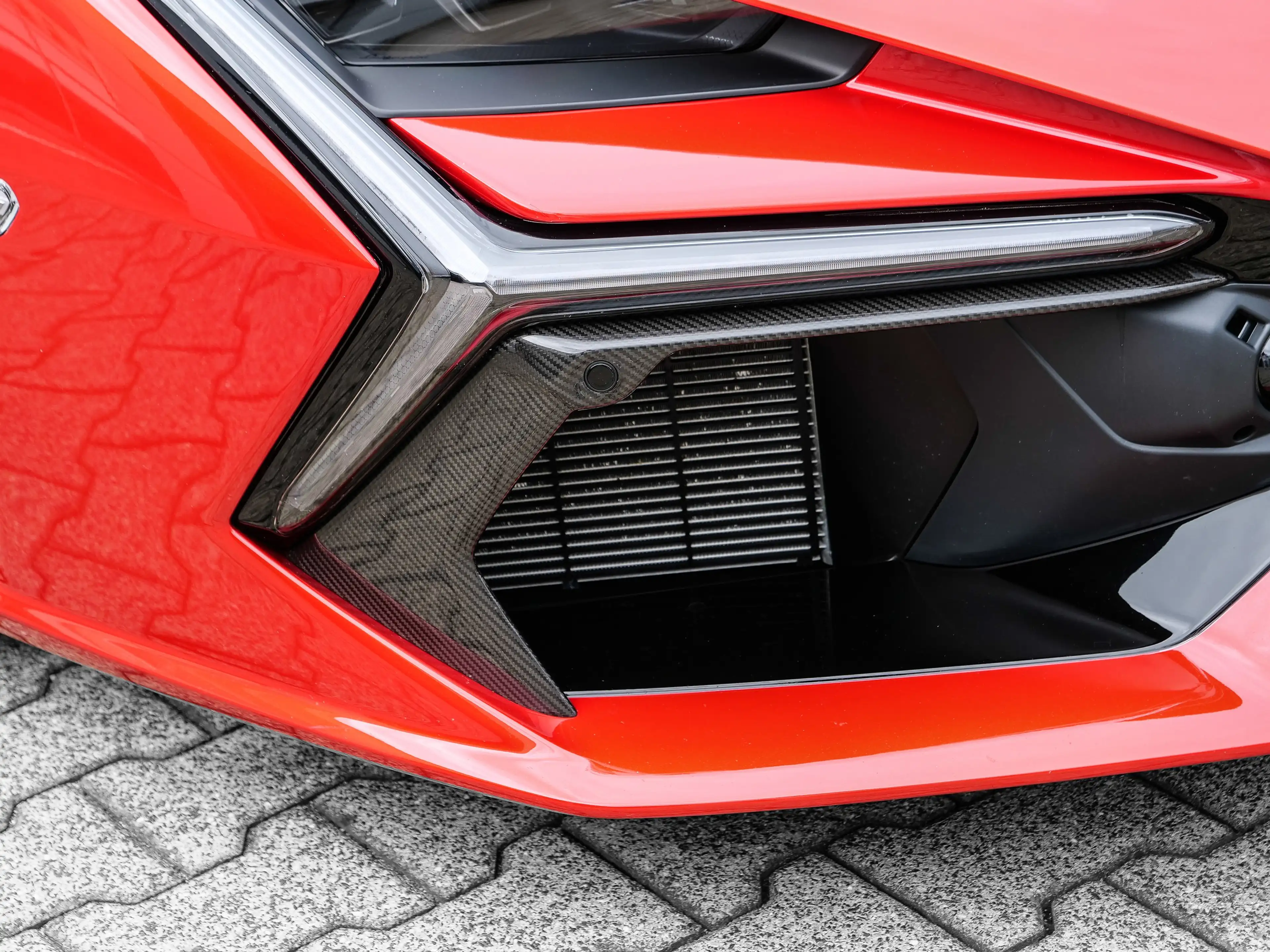 Lamborghini Revuelto Fading Rosso Bia to Nero Granatus — photo 14