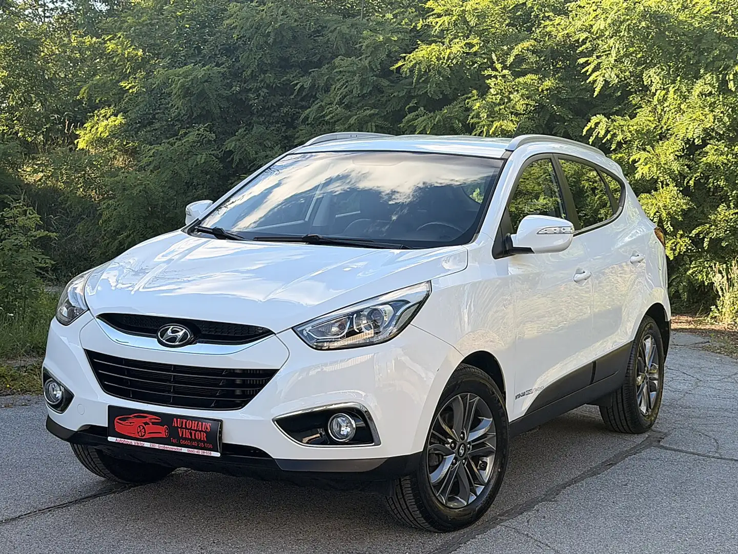 Hyundai iX35 2,0 CRDi GO 4WD *GARANTIE, 1.BESITZ* Weiß - 1