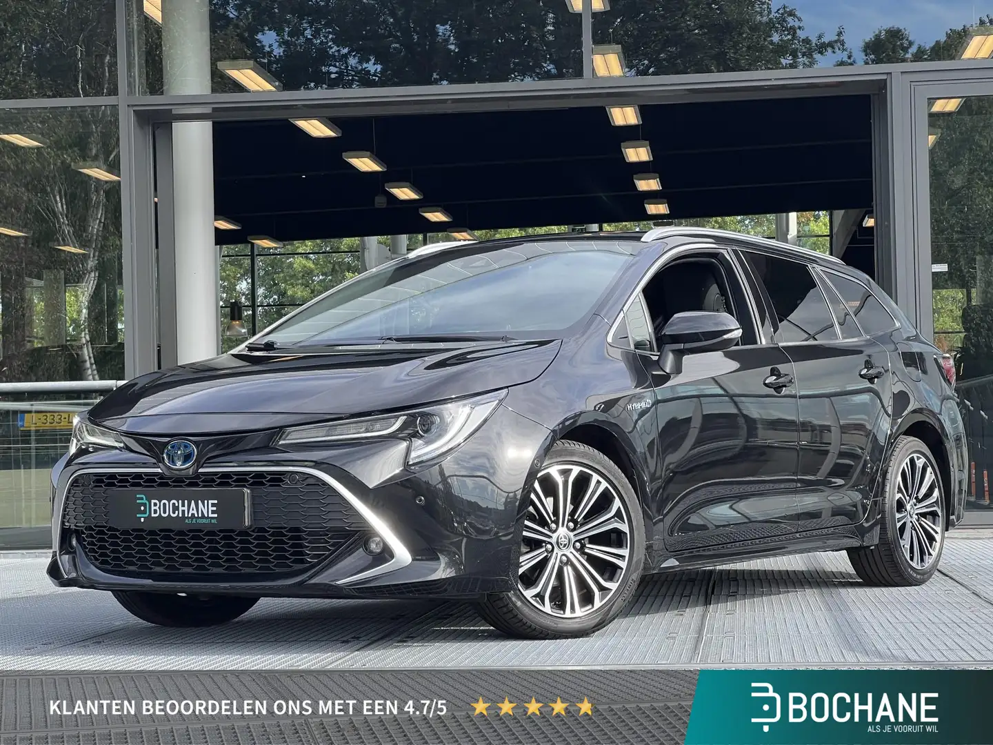 Toyota Corolla Touring Sports 1.8 Hybrid Executive 122PK | Naviga Schwarz - 1