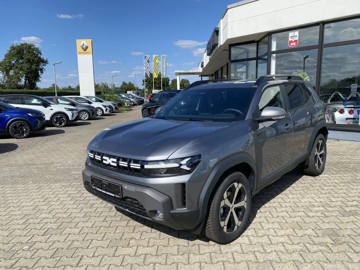 Dacia Duster TCe 130 4x4 Journey Grau - 1