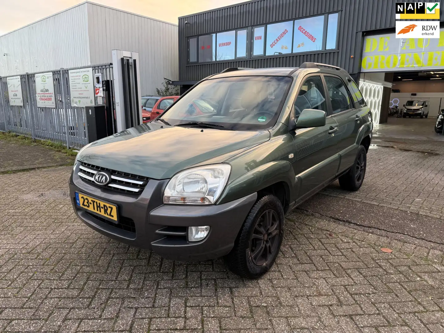 Kia Sportage 2.0 CVVT Executive Groen - 1
