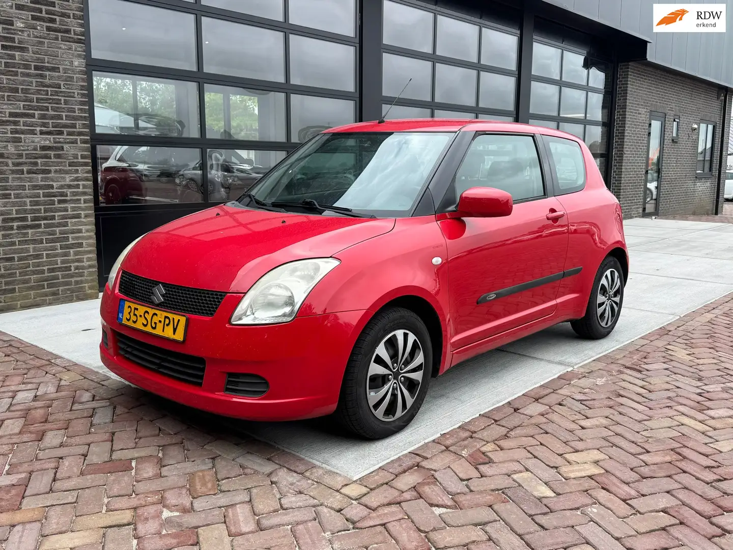 Suzuki Swift 1.3 GLS Inruil Koopje! Rood - 1